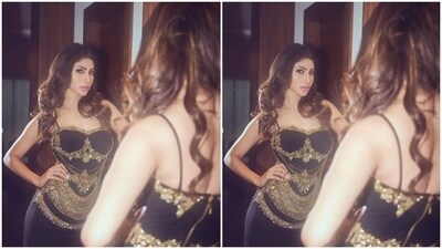 "The usual hustle," wrote Mouni in the caption as she posed for the indoor photoshoot against a mirror. (Instagram/@imouniroy) "The usual hustle," wrote Mouni in the caption as she posed for the indoor photoshoot against a mirror. (Instagram/@imouniroy)