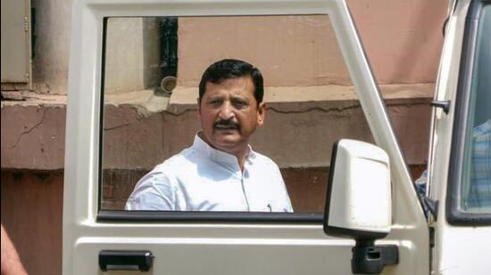 Congress MLA Mamman Khan is produced before a court in Nuh district on Sunday. (PTI)