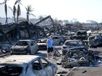 Authorities in Hawaii have adjusted the number of deaths from the deadly Maui wildfire down to at least 97 people.