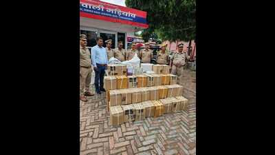 “A total of 624 liquor bottles kept in 52 boxes, 525 small cartons and 2.5 kg of urea were recovered from the house,” the ADCP said, adding all cartons had scannable barcodes. The police were finding out how the accused got hold of the barcodes. (Sourced) “A total of 624 liquor bottles kept in 52 boxes, 525 small cartons and 2.5 kg of urea were recovered from the house,” the ADCP said, adding all cartons had scannable barcodes. The police were finding out how the accused got hold of the barcodes. (Sourced)