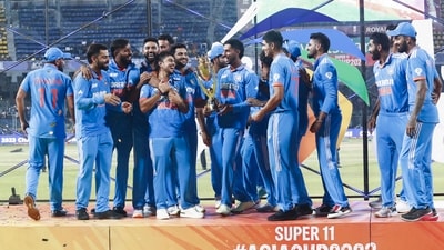 Indian players pose with trophy after winning the Asia Cup final cricket match between India and Sri Lanka in Colombo, Sri Lanka (AP)