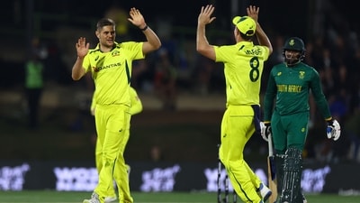 Aaron Hardie celebrates with Mitchell Marsh after taking a wicket (REUTERS)