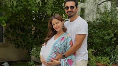 Rubina Dilaik and Abhinav Shukla posed together for a maternity photoshoot recently and the mom-to-be posted a photo from it on Monday. Abhinav held her close as Rubina cradled her baby bump in the picture. She was dressed in a white kurta outfit with a colourful pink and blue dupatta. Rubina Dilaik and Abhinav Shukla posed together for a maternity photoshoot recently and the mom-to-be posted a photo from it on Monday. Abhinav held her close as Rubina cradled her baby bump in the picture. She was dressed in a white kurta outfit with a colourful pink and blue dupatta. 