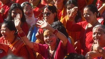 Women dance after offering prayers to Lord Shiva during the celebrations to mark Teej festival at Pashupatinath temple in Kathmandu. (AFP) Women dance after offering prayers to Lord Shiva during the celebrations to mark Teej festival at Pashupatinath temple in Kathmandu. (AFP)