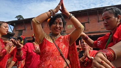 On Monday morning, at 3 am, the Pashupatinath Temple opened all four doors, welcoming devotees who had come to pay homage to Lord Shiva as part of the Teej festival celebration. (AFP) On Monday morning, at 3 am, the Pashupatinath Temple opened all four doors, welcoming devotees who had come to pay homage to Lord Shiva as part of the Teej festival celebration. (AFP)