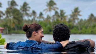 Nayanthara has shared a pool picture with Vignesh Shivan. Nayanthara has shared a pool picture with Vignesh Shivan.