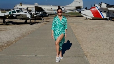 On Monday, Rubina Dilaik shared fresh pictures from her babymoon with Abhinav Shukla. She wore a green dress with a thigh high slit. The actor posed in front of aircrafts in a couple of photos she posted. Her caption read, "Mamacado on babymoon." On Monday, Rubina Dilaik shared fresh pictures from her babymoon with Abhinav Shukla. She wore a green dress with a thigh high slit. The actor posed in front of aircrafts in a couple of photos she posted. Her caption read, "Mamacado on babymoon."