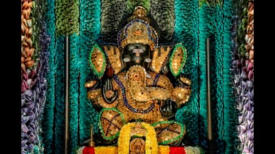 Sri Sathya Sai Ganapathy temple decorated with fifty lakhs coins and more than one crore currency notes on the occasion of Ganesha Chaturthi festival at J.P. Nagar in Bengaluru Monday. (PTI) Sri Sathya Sai Ganapathy temple decorated with fifty lakhs coins and more than one crore currency notes on the occasion of Ganesha Chaturthi festival at J.P. Nagar in Bengaluru Monday. (PTI)