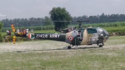 The Chetak helicopter of the Indian Army that landed in empty fields of Shadipur village in Yamunanagar. (HT Photo)
