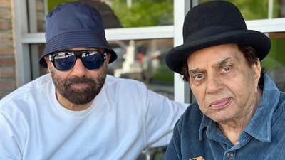 Sunny Deol and Dharmendra at a restaurant in the US. Sunny Deol and Dharmendra at a restaurant in the US.