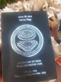 Commemorative coin featuring the new Parliament (Twitter) Commemorative coin featuring the new Parliament (Twitter)