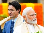Canada's Prime Minister Justin Trudeau and Indian Prime Minister Narendra Modi as they take part in a wreath-laying ceremony at Raj Ghat in New Delhi, 