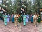 Snapshot of the women dancing to Badal Barsa Bijuli. 