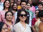 Kangana Ranaut and Esha Gupta pose for group photos with parliamentarians during the special session of Parliament, in New Delhi, Tuesday, Sept. 19, 2023. Kangana Ranaut and Esha Gupta pose for group photos with parliamentarians during the special session of Parliament, in New Delhi, Tuesday, Sept. 19, 2023.