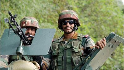 Army personnel return from the encounter site in the Garole forests in Jammu and Kashmir’s Anantnag district on Tuesday. (ANI Photo) Army personnel return from the encounter site in the Garole forests in Jammu and Kashmir’s Anantnag district on Tuesday. (ANI Photo)