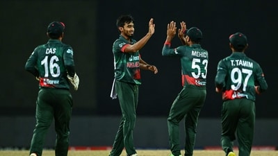 Bangladesh's Tanzim Hasan Sakib (2L) celebrates with teammates after taking the wicket of India's captain Rohit Sharma (AFP) Bangladesh's Tanzim Hasan Sakib (2L) celebrates with teammates after taking the wicket of India's captain Rohit Sharma (AFP)