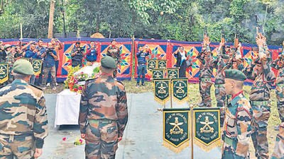 Last rites of sepoy Serto Thangthang Kom, who was abducted and killed last week, were performed in Chandel on Tuesday. (HT Photo) Last rites of sepoy Serto Thangthang Kom, who was abducted and killed last week, were performed in Chandel on Tuesday. (HT Photo)