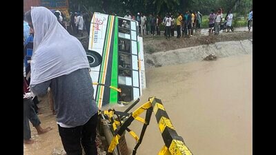 Locals gather after a bus fell into a canal leaving at least eight dead and several injured, on Muktsar-Kotakpura road near Muktsar, on Tuesday. (PTI) Locals gather after a bus fell into a canal leaving at least eight dead and several injured, on Muktsar-Kotakpura road near Muktsar, on Tuesday. (PTI)