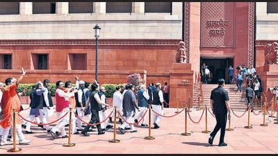 Modi leads MPs to the new Parliament building on Tuesday. (ANI) Modi leads MPs to the new Parliament building on Tuesday. (ANI)
