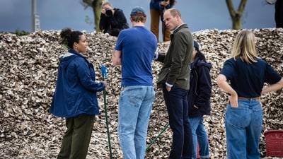 Britain's Prince William, Prince of Wales speaks to students from the Urban Assembly New York Harbor School about the Billion Oyster Project on Governors Island in New York (AP)