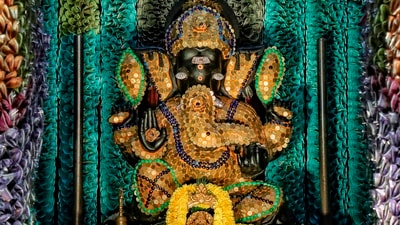 Sri Sathya Sai Ganapathy temple decorated with fifty lakhs coins and more than one crore currency notes on the occasion of Ganesha Chaturthi festival at J.P. Nagar in Bengaluru. (ANI) Sri Sathya Sai Ganapathy temple decorated with fifty lakhs coins and more than one crore currency notes on the occasion of Ganesha Chaturthi festival at J.P. Nagar in Bengaluru. (ANI)