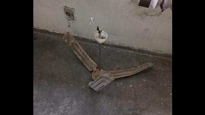 The ceiling fan, weighing about 10-15 kg, that fell on a Panjab University in his classroom. (HT File)
