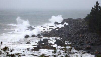 LUBEC, MAINE - SEPTEMBER 16: Waves crash ashore from Post-Tropical Cyclone Lee on September 19, 2023 in Lubec, Maine. Formerly a hurricane, the storm was downgraded, but forecasters say it will remain large and dangerous.   Joe Raedle/Getty Images/AFP (Photo by JOE RAEDLE / GETTY IMAGES NORTH AMERICA / Getty Images via AFP) (Getty Images via AFP)