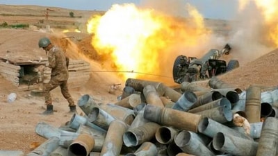 An Armenian soldier fires an artillery piece during fighting with Azerbaijan's forces in self-proclaimed Republic of Nagorno-Karabakh. (AP File) An Armenian soldier fires an artillery piece during fighting with Azerbaijan's forces in self-proclaimed Republic of Nagorno-Karabakh. (AP File)