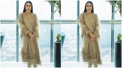 Karisma further accessorised her look for the day in a golden neck choker and statement earrings from the house of Tavji Gold and Diamonds. (Instagram/@therealkarismakapoor) Karisma further accessorised her look for the day in a golden neck choker and statement earrings from the house of Tavji Gold and Diamonds. (Instagram/@therealkarismakapoor)