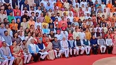 Lok Sabha and Rajya Sabha members pose for a group photograph at the old Parliament House complex during a special session, in New Delhi, Tuesday. (PTI) Lok Sabha and Rajya Sabha members pose for a group photograph at the old Parliament House complex during a special session, in New Delhi, Tuesday. (PTI)