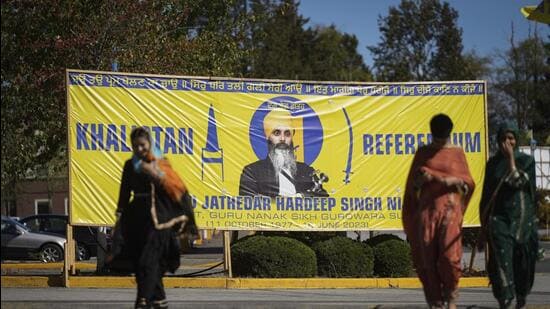 A photograph of Hardeep Singh Nijjar on a banner outside the Guru Nanak Sikh Gurdwara Sahib in Surrey, British Columbia. (AP)