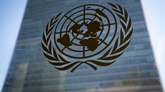 FILE - The symbol of the United Nations is displayed outside the Secretariat Building during an emergency meeting of the UN General Assembly. (AP Photo/John Minchillo, File) (AP)