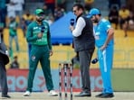 Captains Rohit Sharma (R) and Babar Azam at the toss for the Super Fours match between India and Pakistan in the Asia Cup 2023