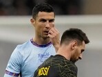 Cristiano Ronaldo and Lionel Messi during an exhibition match. Cristiano Ronaldo and Lionel Messi during an exhibition match.