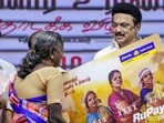 Tamil Nadu chief minister M.K. Stalin with a beneficiary during the launch of the 'Kalaignar Magalir Urimai Thittam' (Kalaignar Women's Rights Assistance Scheme), offering <span class='webrupee'>₹</span>1,000 monthly assistance to women, in Kancheepuram district on September 15. Tamil Nadu chief minister M.K. Stalin with a beneficiary during the launch of the 'Kalaignar Magalir Urimai Thittam' (Kalaignar Women's Rights Assistance Scheme), offering <span class='webrupee'>₹</span>1,000 monthly assistance to women, in Kancheepuram district on September 15.