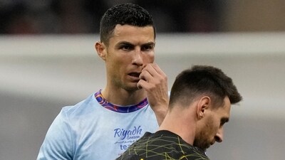 Cristiano Ronaldo and Lionel Messi during an exhibition match. (AP) Cristiano Ronaldo and Lionel Messi during an exhibition match. (AP)