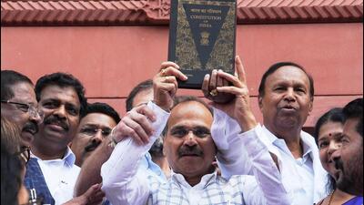 Adhir Ranjan Chowdhury holding a copy of the Constitution. (PTI)
