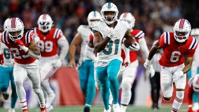 Miami Dolphins running back Raheem Mostert (31) out runs the New England Patriots for a 43-yard touchdown during the fourth quarter of an NFL football game, Sunday, Sept. 17, 2023, in Foxborough, Mass. (AP Photo/Michael Dwyer) (AP) Miami Dolphins running back Raheem Mostert (31) out runs the New England Patriots for a 43-yard touchdown during the fourth quarter of an NFL football game, Sunday, Sept. 17, 2023, in Foxborough, Mass. (AP Photo/Michael Dwyer) (AP)