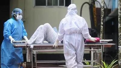 Health workers shift a man with symptoms of Nipah virus to an isolation ward at a government hospital in Kozhikode in Kerala on Saturday. (AFP)