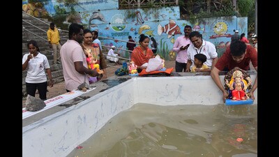 On Wednesday the second day of Ganeshotsav, many faithful performed immersion of the idol according to the tradition. (HT PHOTO) On Wednesday the second day of Ganeshotsav, many faithful performed immersion of the idol according to the tradition. (HT PHOTO)