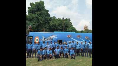 School children posing with the IPEV vehicle of the IAF in Prayagraj on Wednesday. (HT Photo)