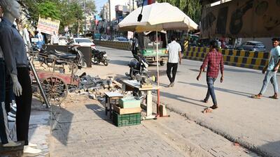 The deceased was later identified by his first name as Sheenu, who used to live on a tricycle under a temporary tent at the location. Investigators said that Sheenu would beg and even sleep on the tricycle or the nearby footpath. (Parveen Kumar/HT Photo) The deceased was later identified by his first name as Sheenu, who used to live on a tricycle under a temporary tent at the location. Investigators said that Sheenu would beg and even sleep on the tricycle or the nearby footpath. (Parveen Kumar/HT Photo)