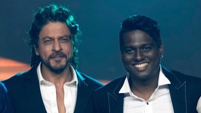 Shah Rukh Khan and Atlee pose for photographs during a press conference after success of their movie 'Jawan' in Mumbai. (AP) Shah Rukh Khan and Atlee pose for photographs during a press conference after success of their movie 'Jawan' in Mumbai. (AP)