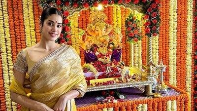 Janhvi Kapoor visited Manish Malhotra's home on the occasion of Ganesh Chaturthi. She looked beautiful in a golden silk saree and had her hair tied in a bun as she posed besides Lord Ganpati idol.&nbsp; 