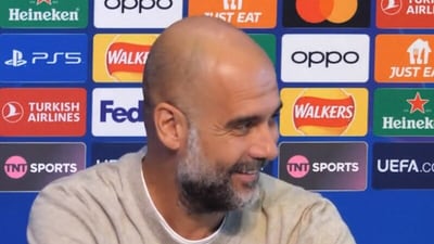 Pep Guardiola reacts to Manchester United's name being suggested among title contenders (Twitter) Pep Guardiola reacts to Manchester United's name being suggested among title contenders (Twitter)