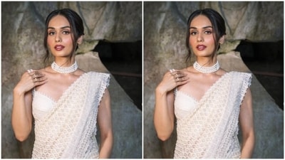 Manushi decked up in a white saree featuring intricate embroidery work in white threads and teamed it with a matching sleeveless blouse. (Instagram/@manushi_chhillar) Manushi decked up in a white saree featuring intricate embroidery work in white threads and teamed it with a matching sleeveless blouse. (Instagram/@manushi_chhillar)
