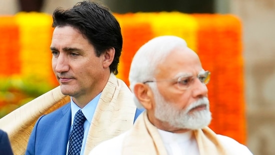 FILE - Canada's Prime Minister Justin Trudeau (L) walks past Indian Prime Minister Narendra Modi (R) FILE - Canada's Prime Minister Justin Trudeau (L) walks past Indian Prime Minister Narendra Modi (R)