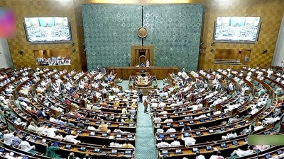 Members of Parliament while voting on clauses of the women's reservation bill on demand of an Opposition MP in Lok Sabha during the Special Session of Parliament in New Delhi on Wednesday. (ANI) Members of Parliament while voting on clauses of the women's reservation bill on demand of an Opposition MP in Lok Sabha during the Special Session of Parliament in New Delhi on Wednesday. (ANI)