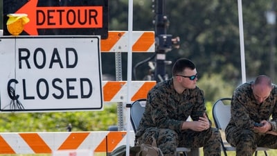 Marines sit under a tent at a checkpoint along Old Georgetown Road, Tuesday, Sept. 19, 2023, in Williamsburg County, S.C., about 60 miles (96 km) northeast of Joint Base Charleston where a recovery operation for an F-35B Lightning II crash landed over the weekend (Henry Taylor/The Post And Courier via AP) (AP) Marines sit under a tent at a checkpoint along Old Georgetown Road, Tuesday, Sept. 19, 2023, in Williamsburg County, S.C., about 60 miles (96 km) northeast of Joint Base Charleston where a recovery operation for an F-35B Lightning II crash landed over the weekend (Henry Taylor/The Post And Courier via AP) (AP)