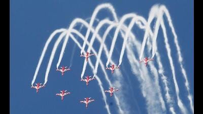 IAF Surya Kiran Aerobatic Team during the full dress rehearsals on the eve of air show in Jammu, on Thursday. (ANI)